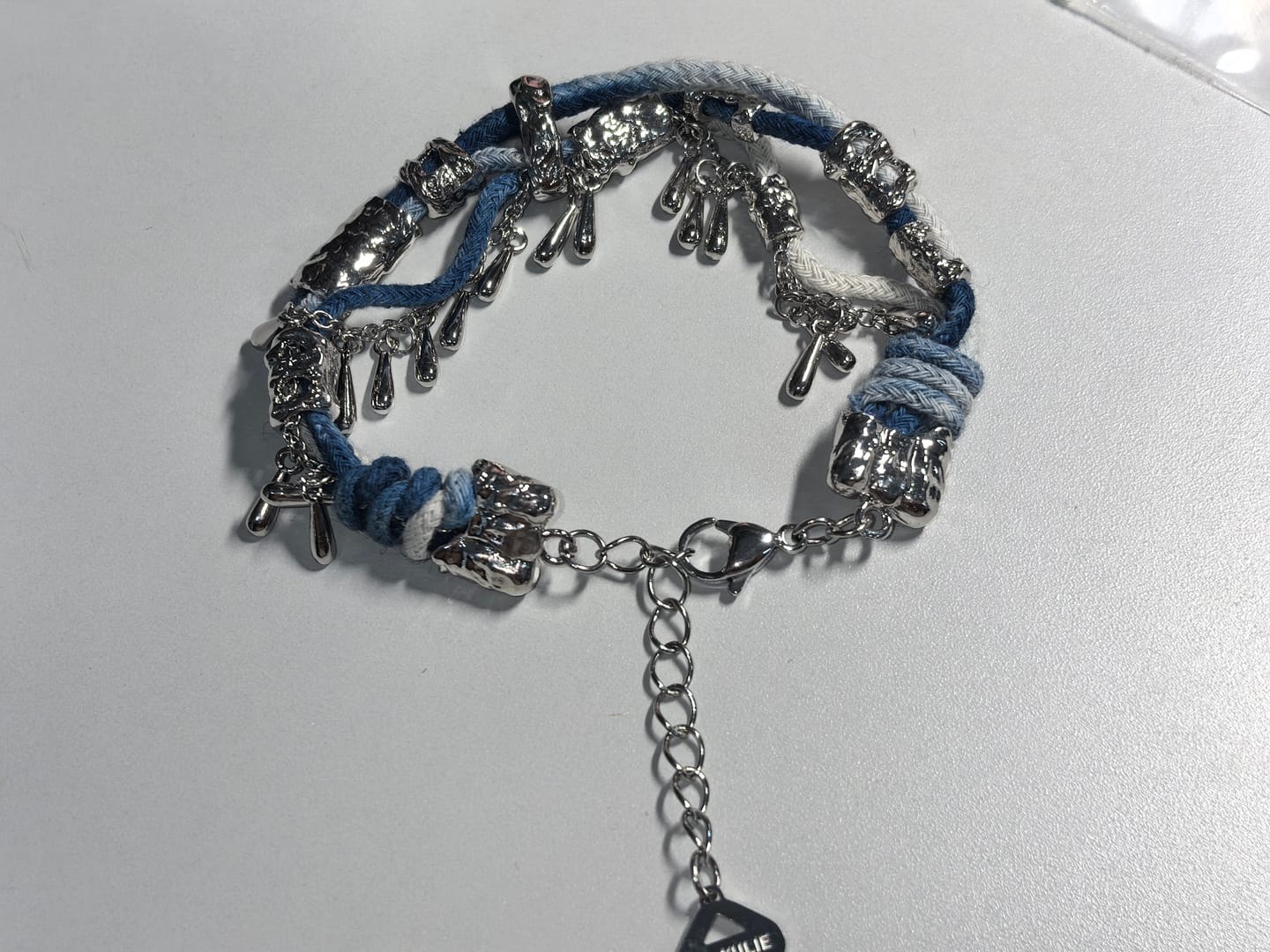 Customer photo review of "MIAO" Platinum Plated Ethnic Braided Tassel Bracelet, Statement Woven Handchain