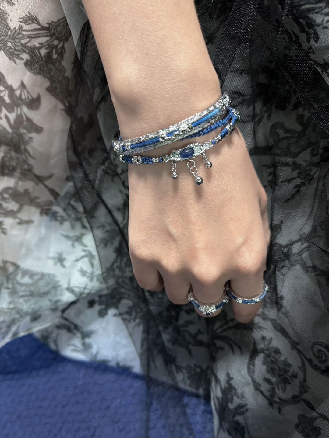 Customer photo review of "MIAO" Platinum Plated Blue Braided Bracelet