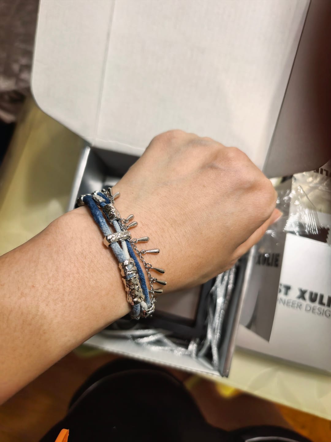 Customer photo review of "MIAO" Platinum Plated Ethnic Braided Tassel Bracelet, Statement Woven Handchain