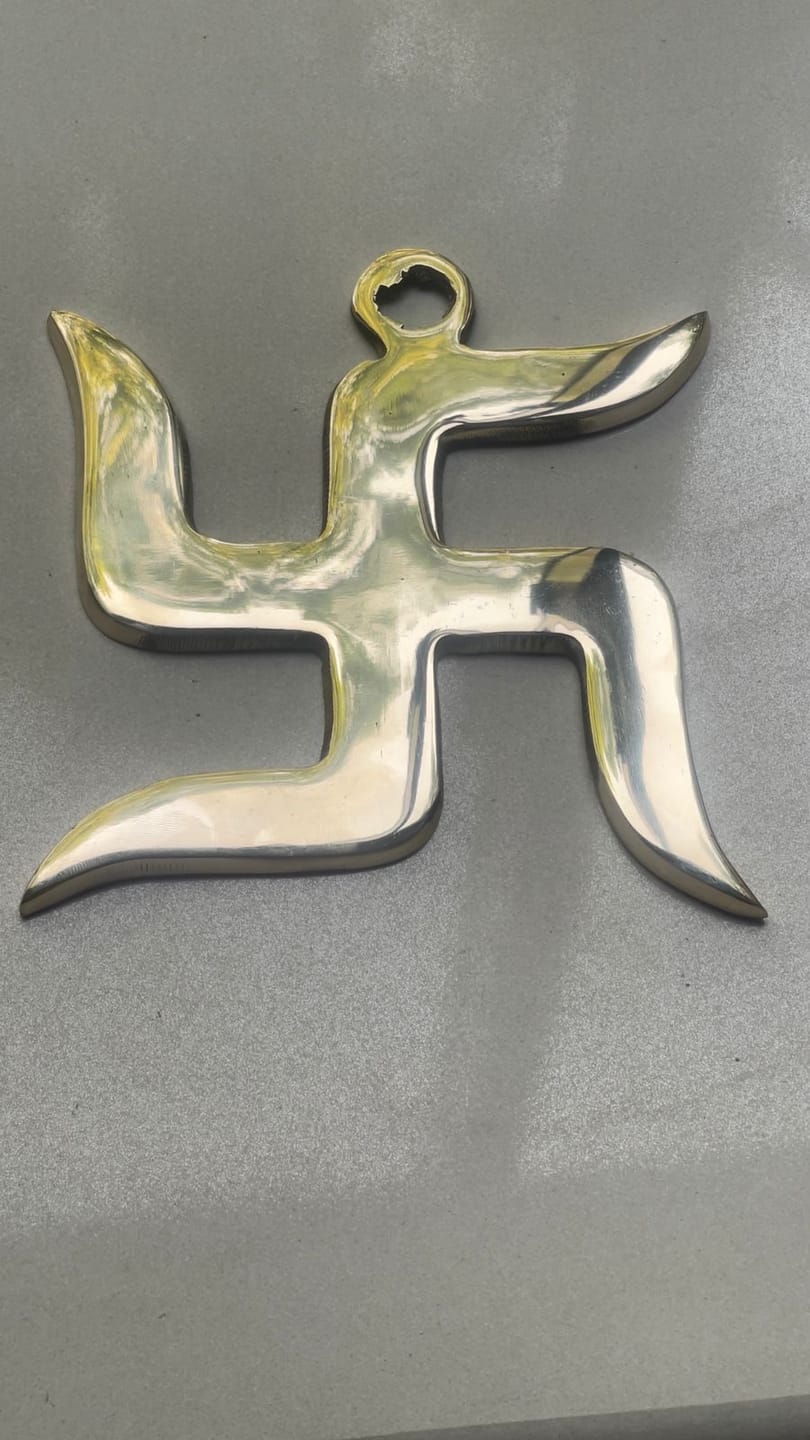 Customer photo review of Brass Swastik Wall Symbol | Vastu Remedy for Main Entrance & Auspicious Energy | 5 & 9 Inch