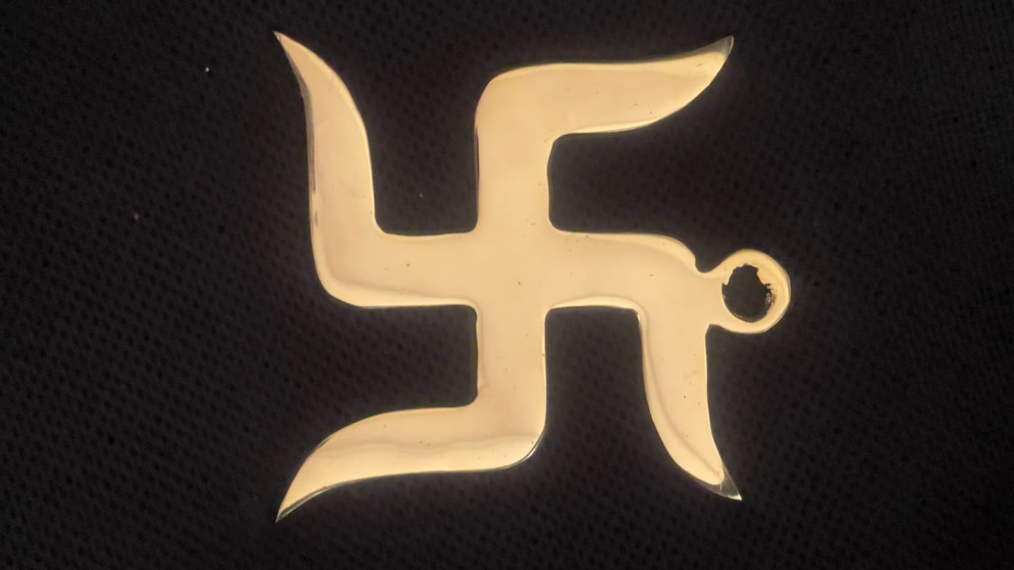 Customer photo review of Brass Swastik Wall Symbol | Vastu Remedy for Main Entrance & Auspicious Energy | 5 & 9 Inch