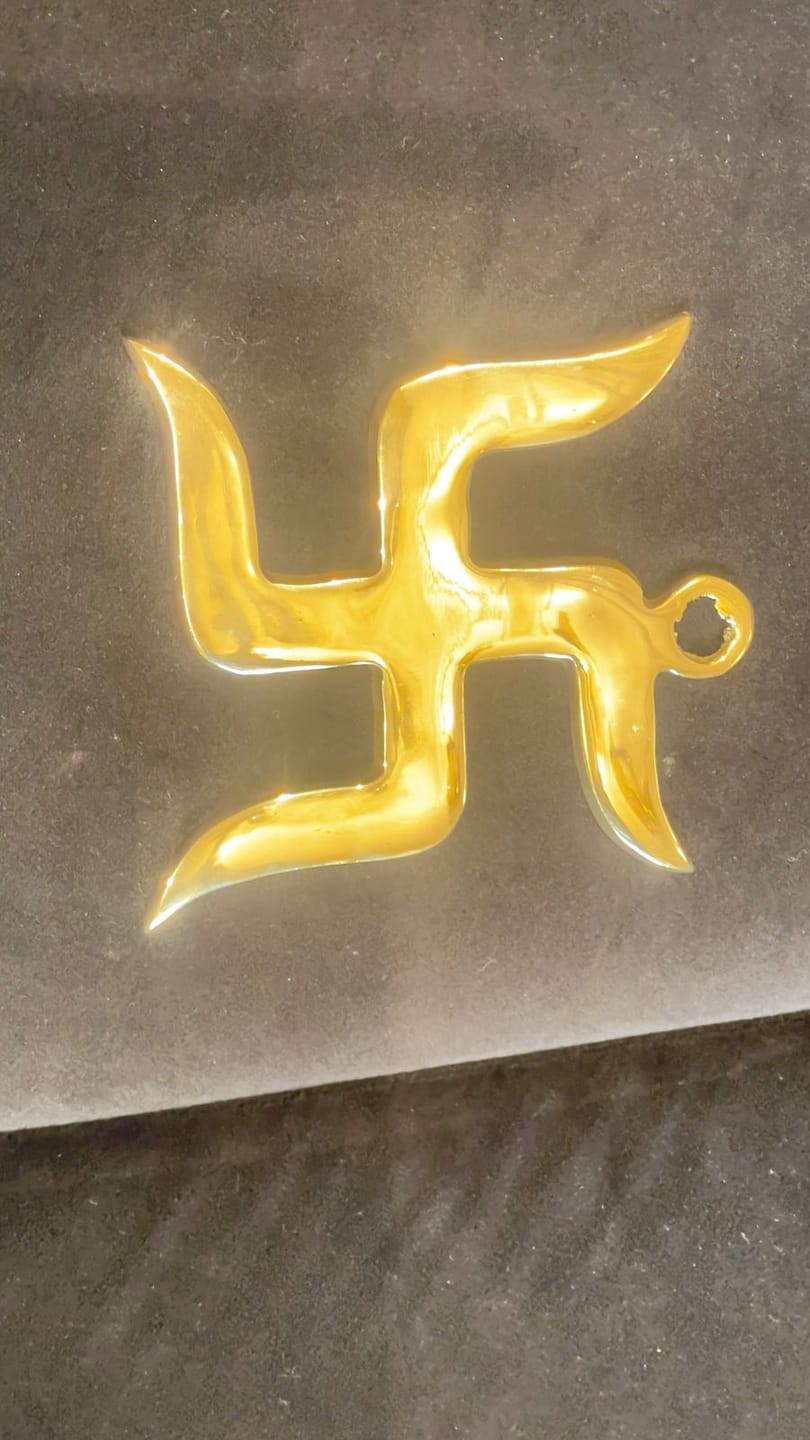 Customer photo review of Brass Swastik Wall Symbol | Vastu Remedy for Main Entrance & Auspicious Energy | 5 & 9 Inch