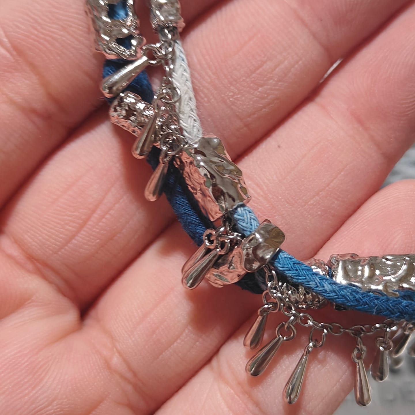 Customer photo review of "MIAO" Platinum Plated Ethnic Braided Tassel Bracelet, Statement Woven Handchain