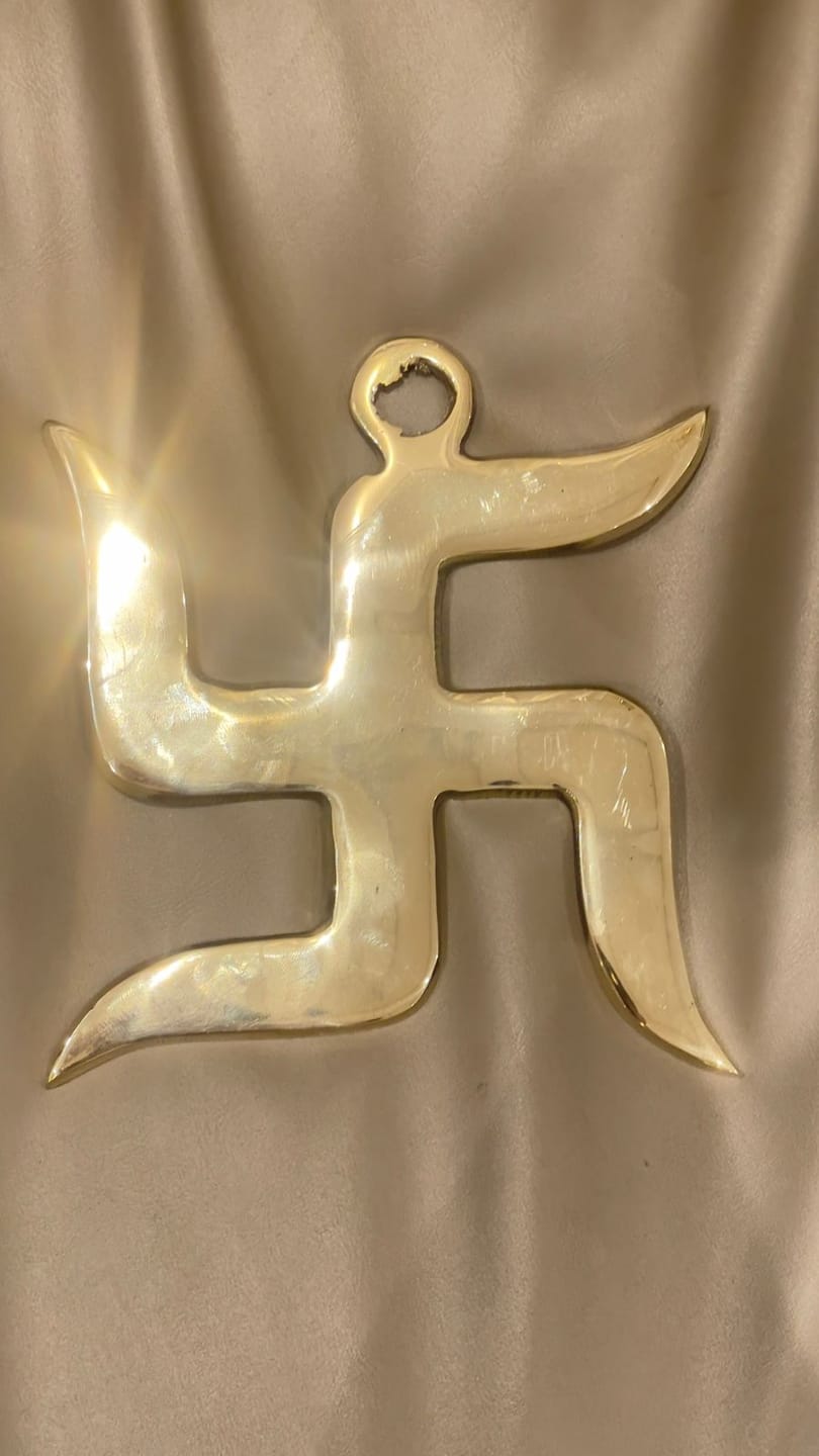 Customer photo review of Brass Swastik Wall Symbol | Vastu Remedy for Main Entrance & Auspicious Energy | 5 & 9 Inch