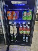 Customer photo review of Simzlife 4.5 Cu.ft Beverage Refrigerator and Cooler, 145 Can Mini fridge with Glass Door for Soda Beer Wine, Small Drink Dispenser with Digital Adjustable Thermostat for Home Office Bar