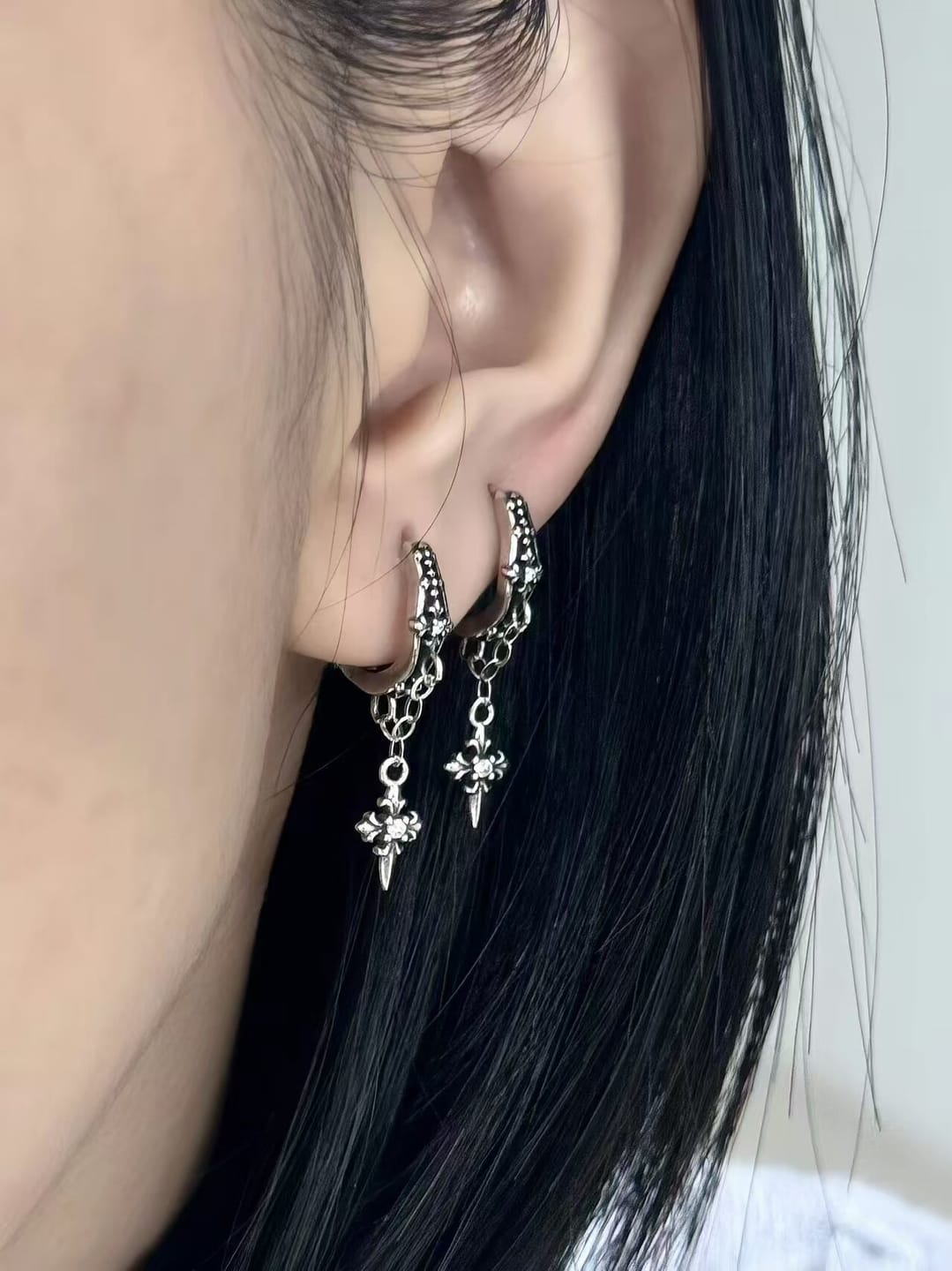 Customer photo review of "Irises" 925 Sterling Silver Gothic Oxidized Dangle Cross Earrings