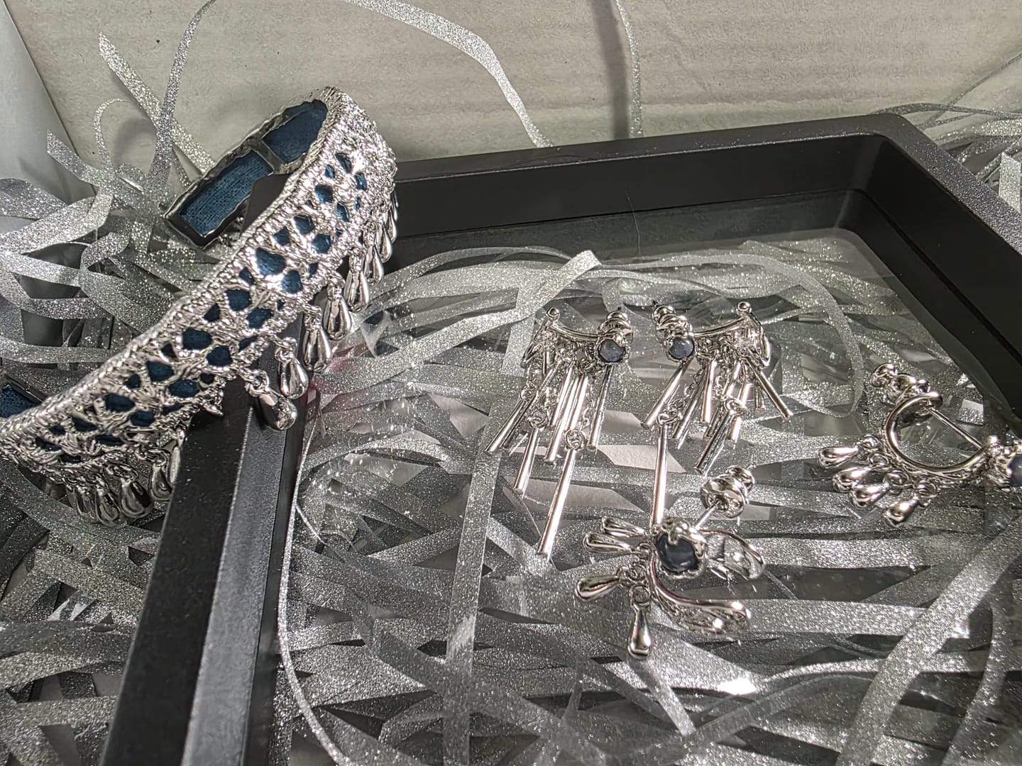 Customer photo review of "MIAO" Platinum Plated Ethnic Tie-Dye Tassel Bangle, Statement Cuff Bracelet