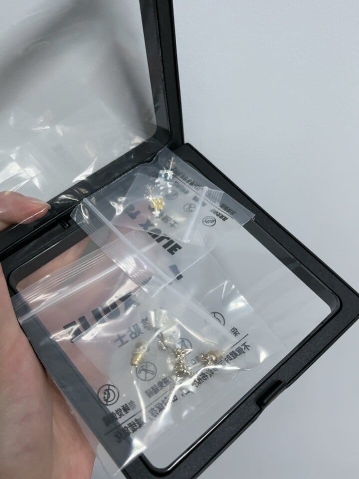 Customer photo review of "WISHING STAR" Rhodium Plated Zirconia Wishing Star Stud Earrings, Celestial Star Earrings