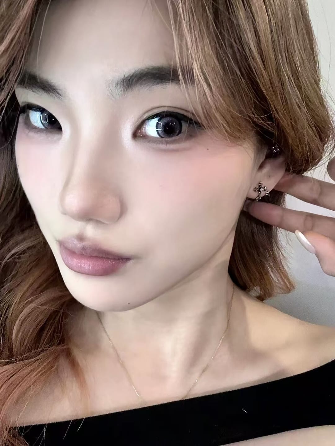 Customer photo review of "Irises" 925 Sterling Silver Oxidized Cross Stud Earrings, Vintage Style