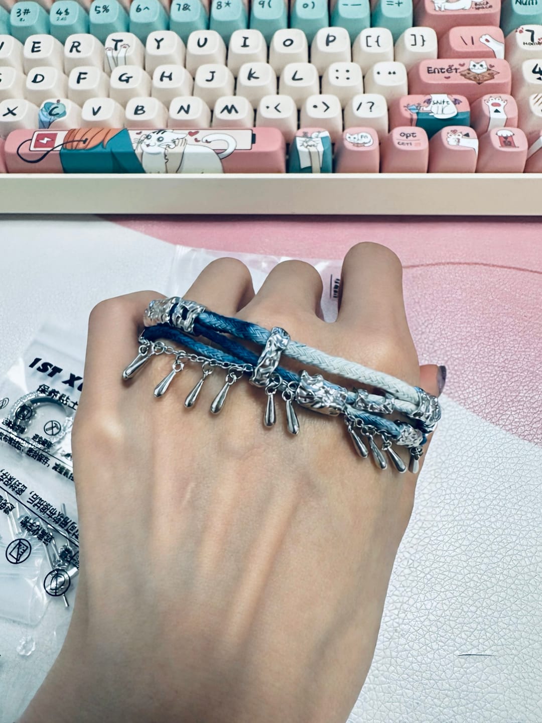 Customer photo review of "MIAO" Platinum Plated Ethnic Braided Tassel Bracelet, Statement Woven Handchain