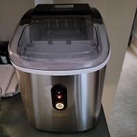 Customer photo review of Simzlife Portable Countertop Ice Maker, 26 Lbs/24H, 9 Bullet-Shaped Ice Cubes in 6 Minutes, Self-Cleaning Ice Machine, Red
