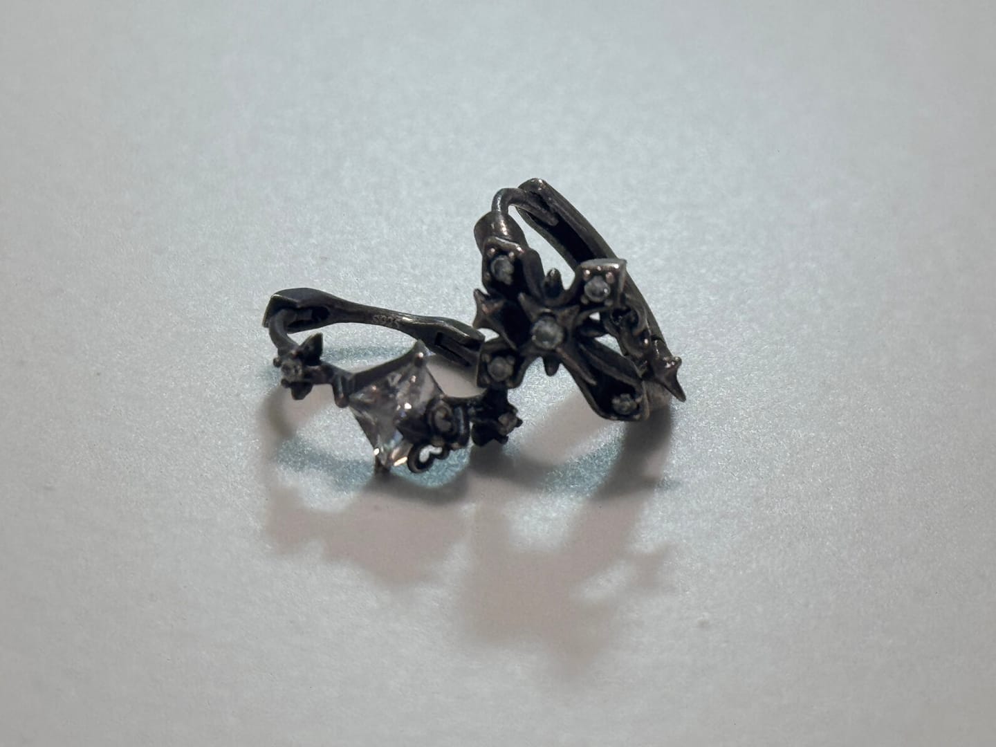 Customer photo review of "Irises" 925 Sterling Silver Gothic Oxidized Dangle Cross Earrings