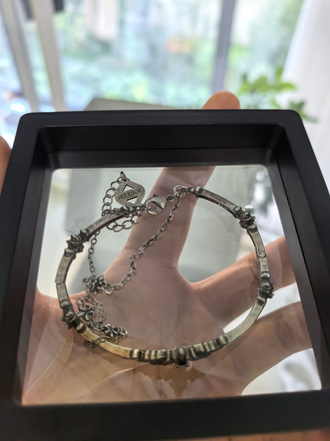 Customer photo review of "FALLEN ANGEL" Antiqued Silver Plated Vintage Fallen Angel Bangle, Statement Bracelet
