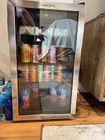 Customer photo review of Simzlife 4.5 Cu.ft Beverage Refrigerator and Cooler, 145 Can Mini fridge with Glass Door for Soda Beer Wine, Small Drink Dispenser with Digital Adjustable Thermostat for Home Office Bar
