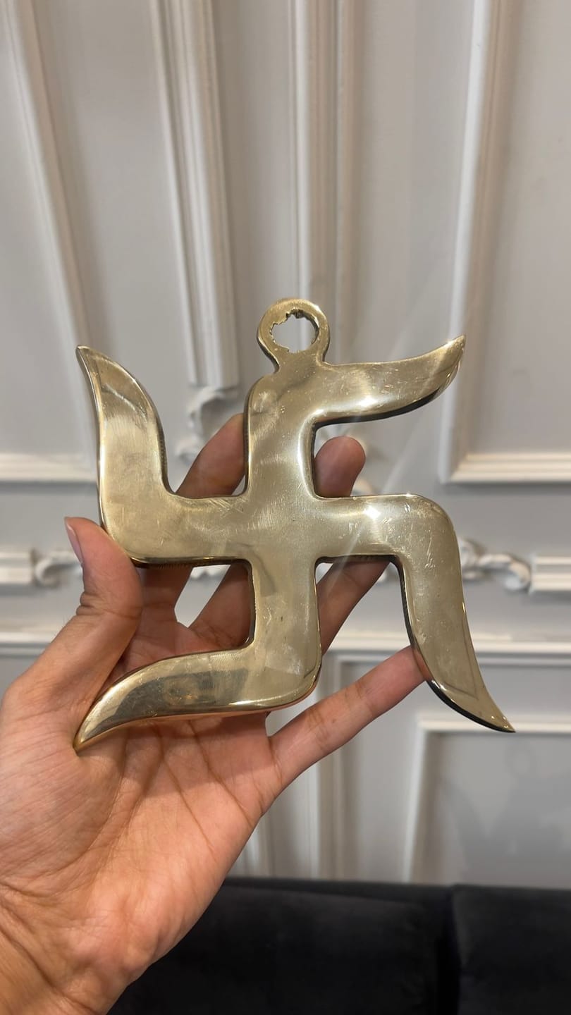 Customer photo review of Brass Swastik Wall Symbol | Vastu Remedy for Main Entrance & Auspicious Energy | 5 & 9 Inch
