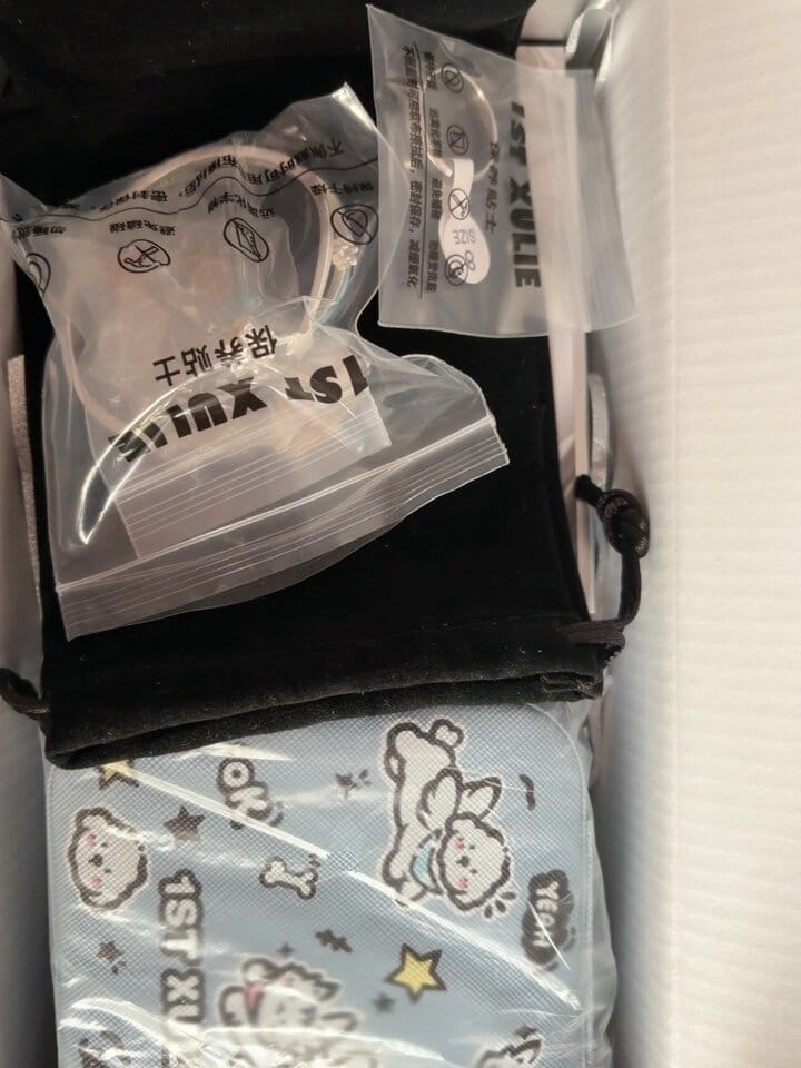 Customer photo review of "WISHING STAR" Platinum Plated Wishing Bottle Dangle Earrings