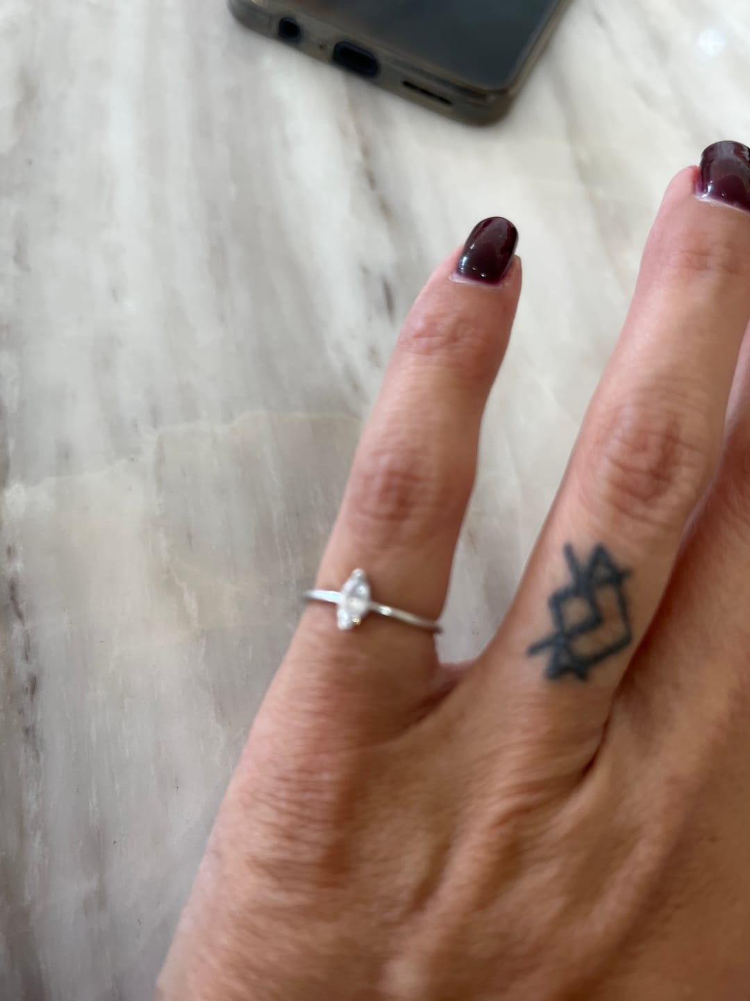 Customer photo review of Par Arracada Zirconias Birthstone Plateada