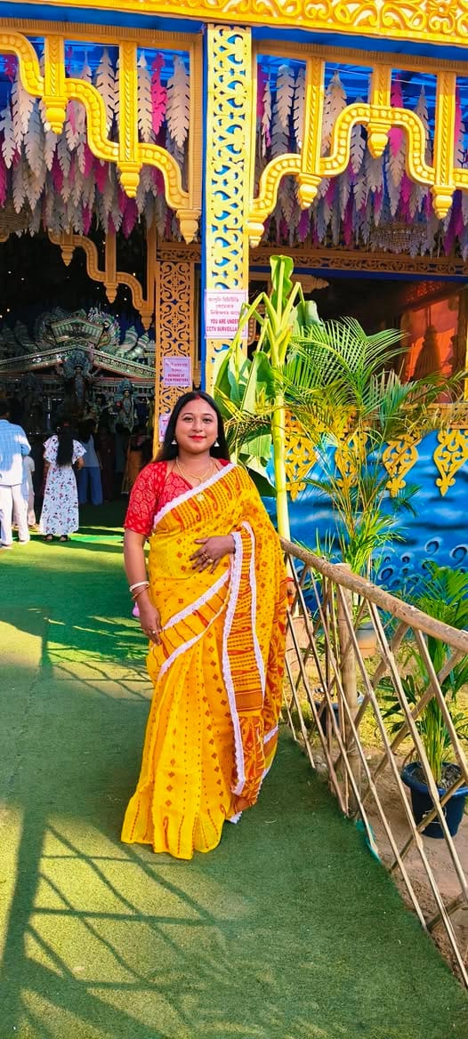 Customer photo review of Binodini Bengal Jamdani Saree ( Red and Yellow )