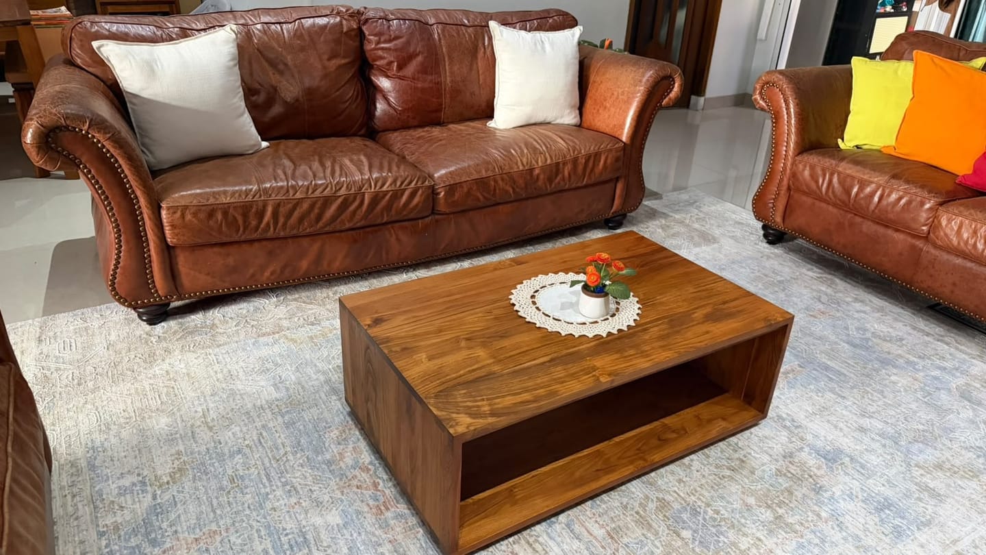 Customer photo review of Timeless Teak Coffee Table with Seamless Storage