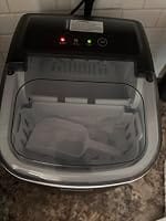Customer photo review of Simzlife Portable Countertop Ice Maker, 26 Lbs/24H, 9 Bullet-Shaped Ice Cubes in 6 Minutes, Self-Cleaning Ice Machine, Red