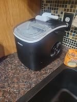 Customer photo review of Simzlife Portable Countertop Ice Maker, 26 Lbs/24H, 9 Bullet-Shaped Ice Cubes in 6 Minutes, Self-Cleaning Ice Machine, Red
