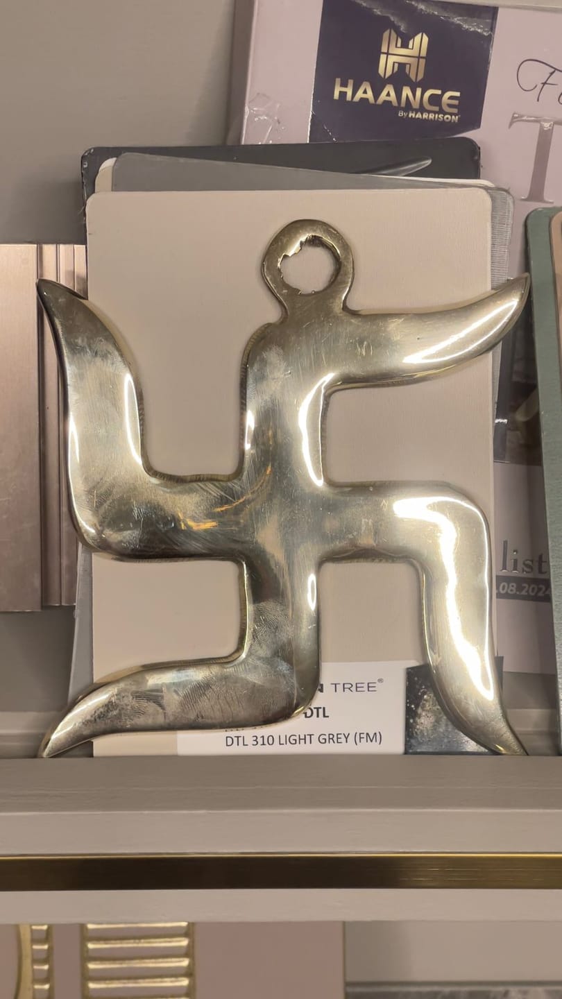 Customer photo review of Brass Swastik Wall Symbol | Vastu Remedy for Main Entrance & Auspicious Energy | 5 & 9 Inch