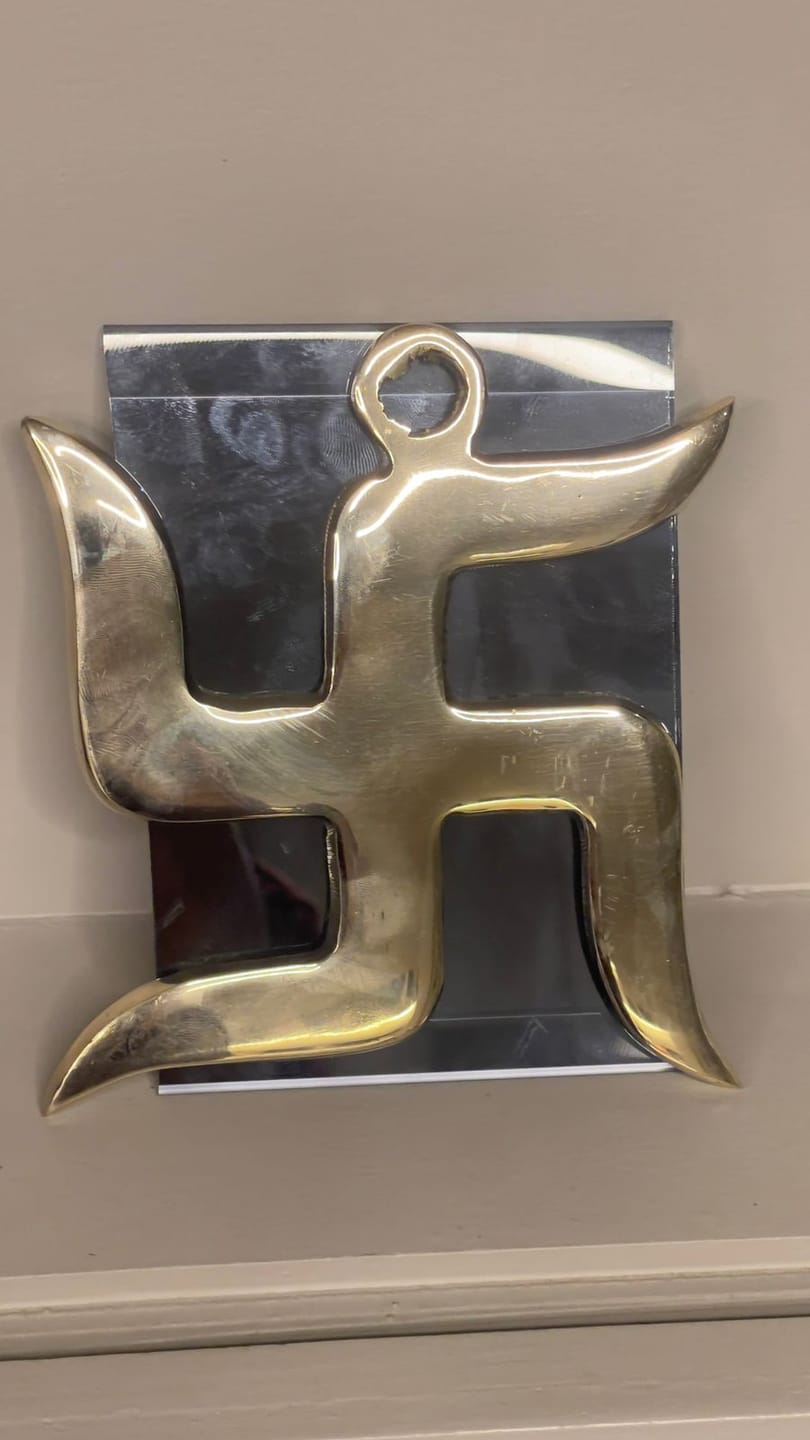 Customer photo review of Brass Swastik Wall Symbol | Vastu Remedy for Main Entrance & Auspicious Energy | 5 & 9 Inch