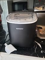 Customer photo review of Simzlife Portable Countertop Ice Maker, 26 Lbs/24H, 9 Bullet-Shaped Ice Cubes in 6 Minutes, Self-Cleaning Ice Machine, Red
