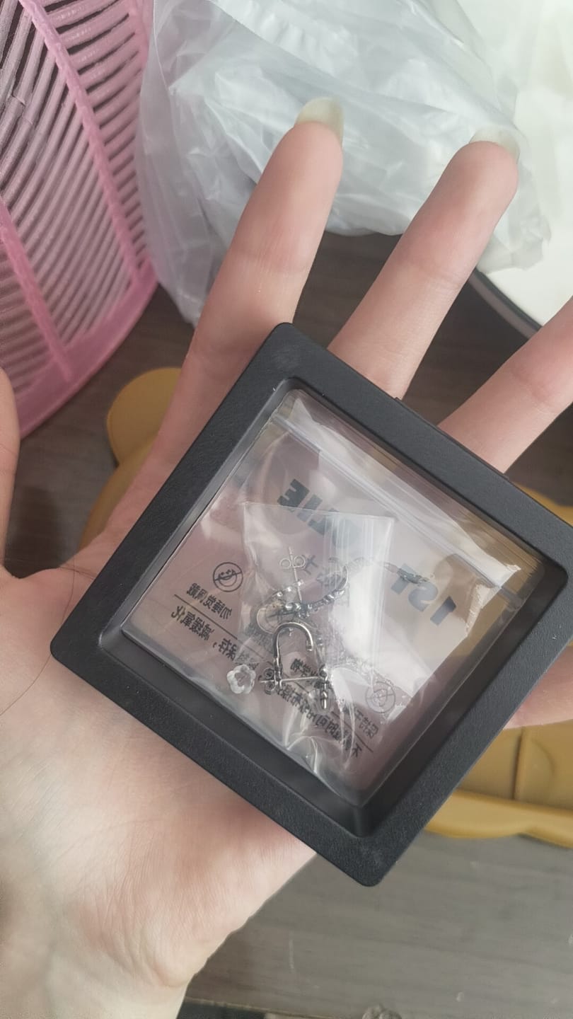 Customer photo review of "Irises" 925 Sterling Silver Oxidized Cross Stud Earrings, Vintage Style