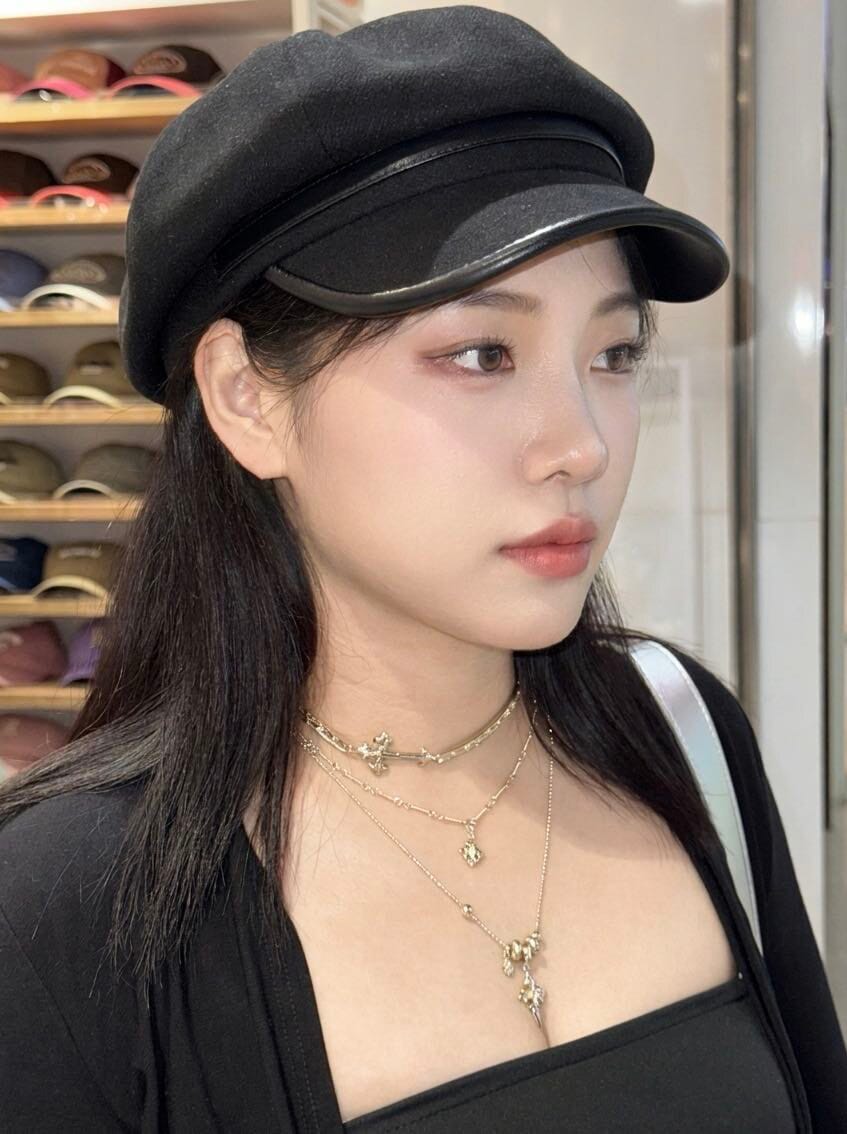 Customer photo review of "Bastet" 14K Gold Plated Iris Cross Pendant Necklace, Floral Statement Jewelry