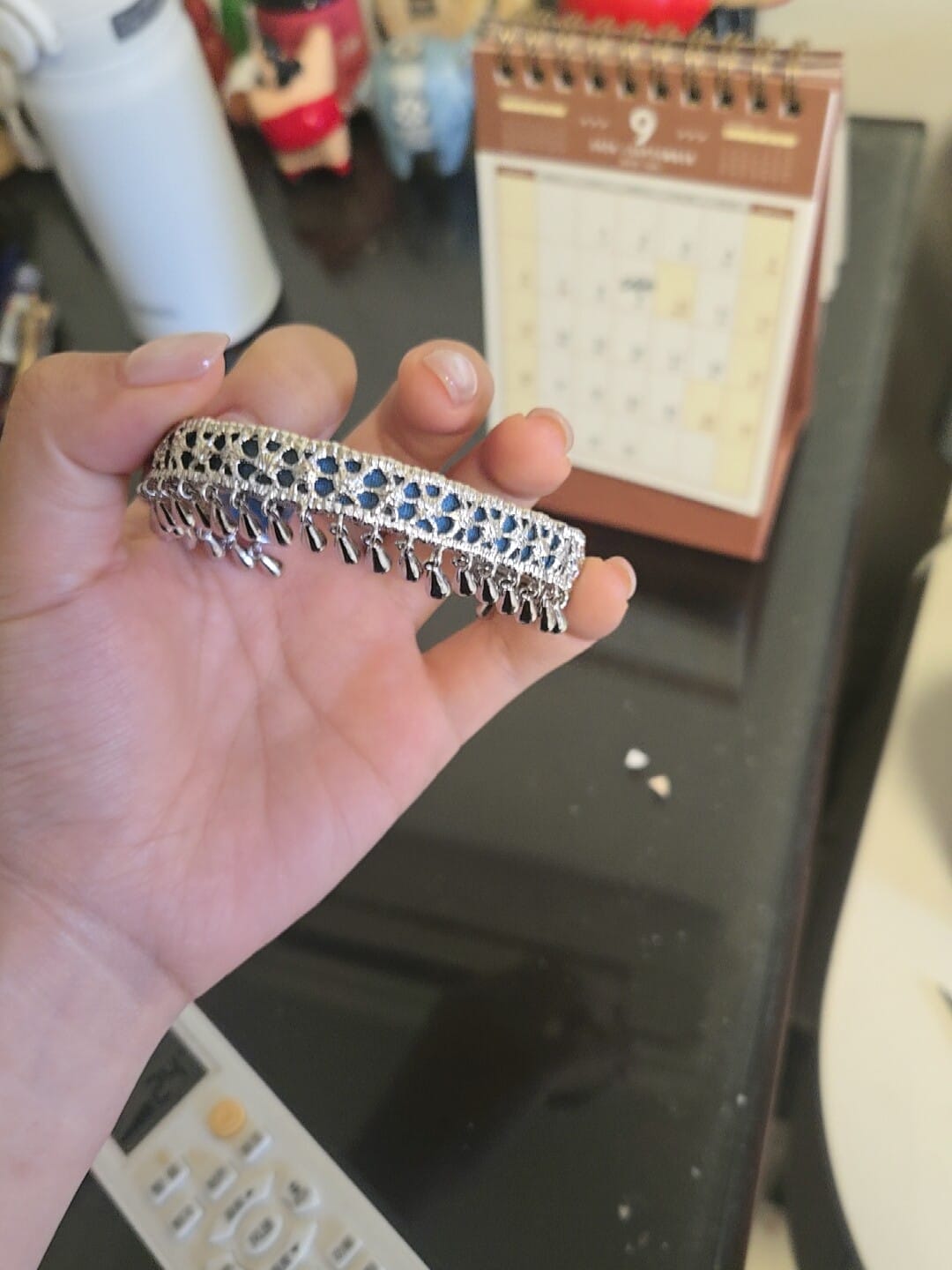 Customer photo review of "MIAO" Platinum Plated Ethnic Tie-Dye Tassel Bangle, Statement Cuff Bracelet