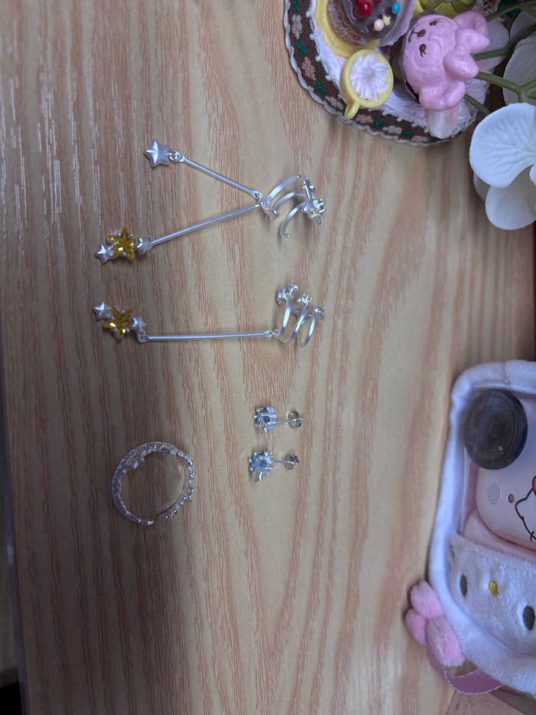 Customer photo review of "WISHING STAR" Rhodium Plated Zirconia Wishing Star Stud Earrings, Celestial Star Earrings