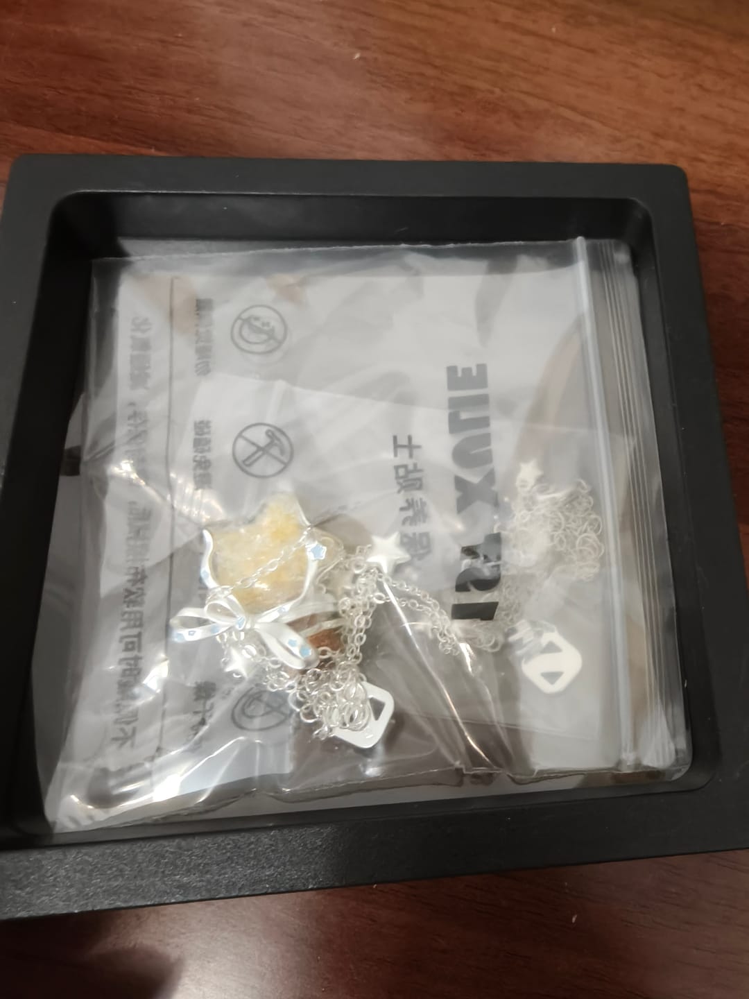 Customer photo review of "WISHING STAR" Rhodium Plated Wishing Fountain Pendant Necklace, Zirconia Dainty Necklace