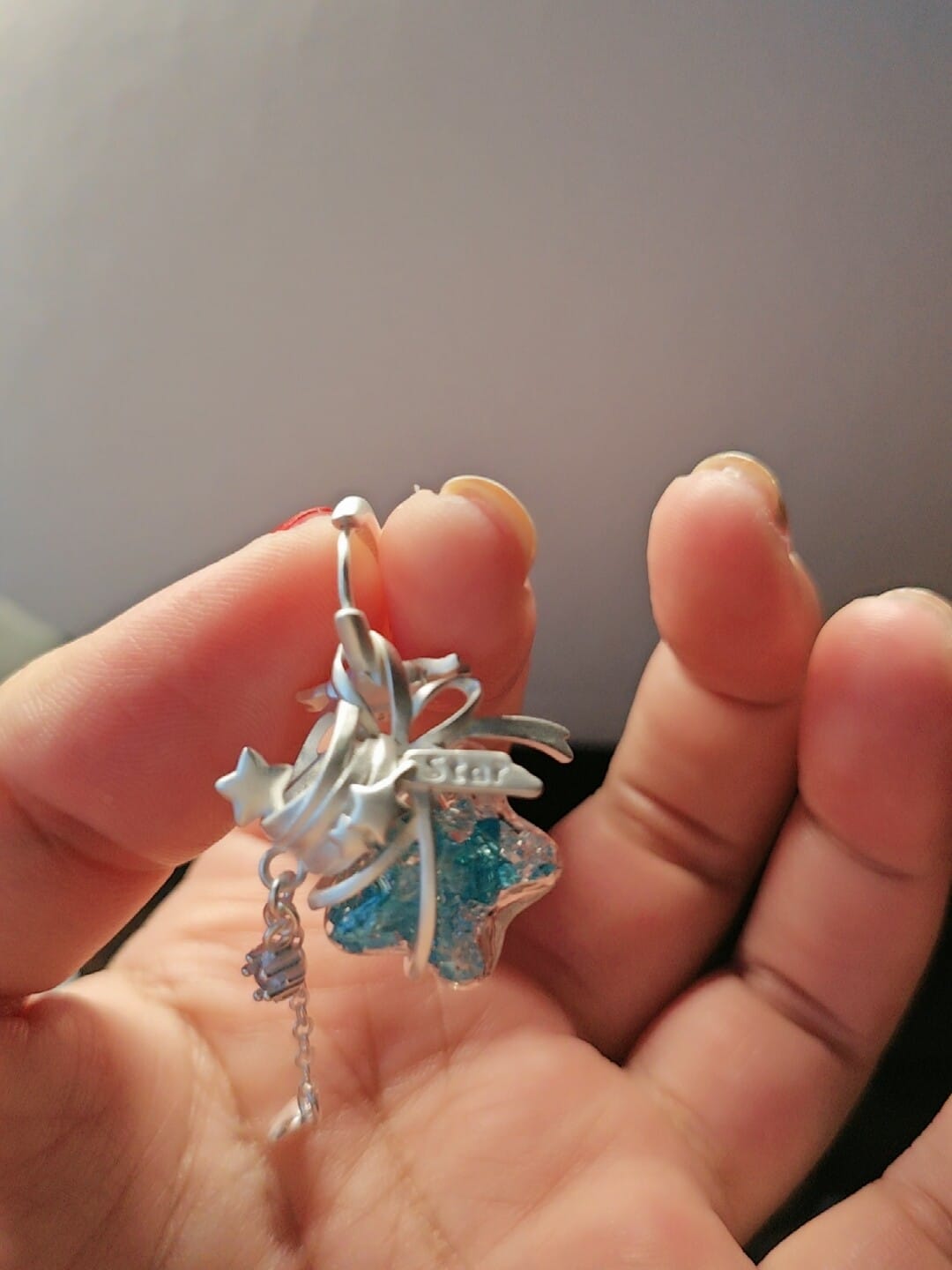 Customer photo review of "WISHING STAR" Platinum Plated Wishing Bottle Dangle Earrings