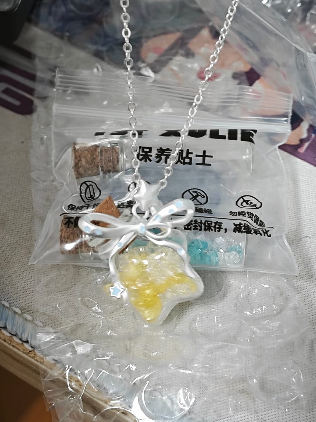 Customer photo review of “WISHING STAR” Platinum Plated Wishing Bottle Star Statement Pendant Necklace