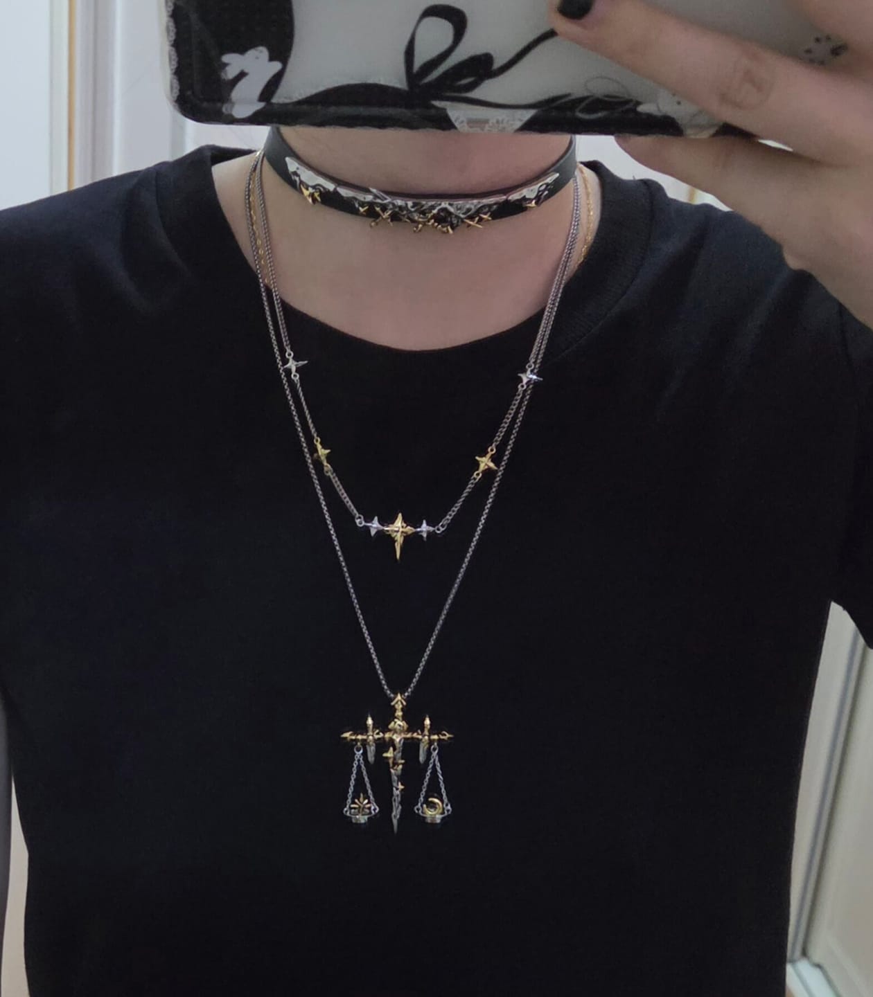 Customer photo review of "Knight's Oath" 18K Gold Plated Sword Leather Choker Necklace, Statement Pendant Necklace