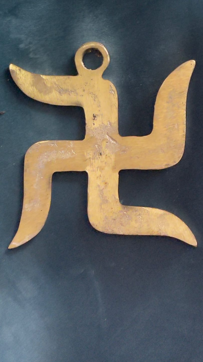 Customer photo review of Brass Swastik Wall Symbol | Vastu Remedy for Main Entrance & Auspicious Energy | 5 & 9 Inch