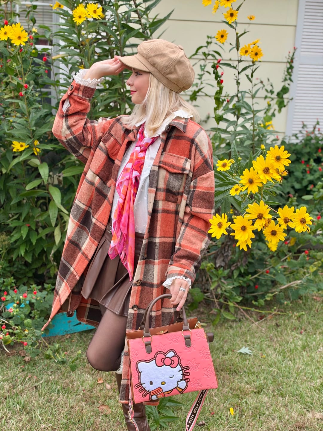 Customer photo review of Loungefly Sanrio Hello Kitty Pumpkin Spice Latte Wave Crossbody Bag