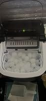 Customer photo review of Simzlife Portable Countertop Ice Maker, 26 Lbs/24H, 9 Bullet-Shaped Ice Cubes in 6 Minutes, Self-Cleaning Ice Machine, Red