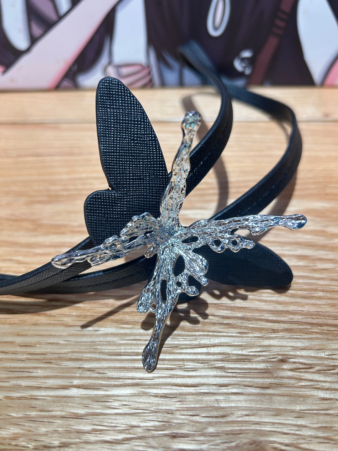 Customer photo review of "ButterflyWasteland" Platinum Plated Gothic Butterfly Bolo Tie Necklace, Adjustable Lariat Choker