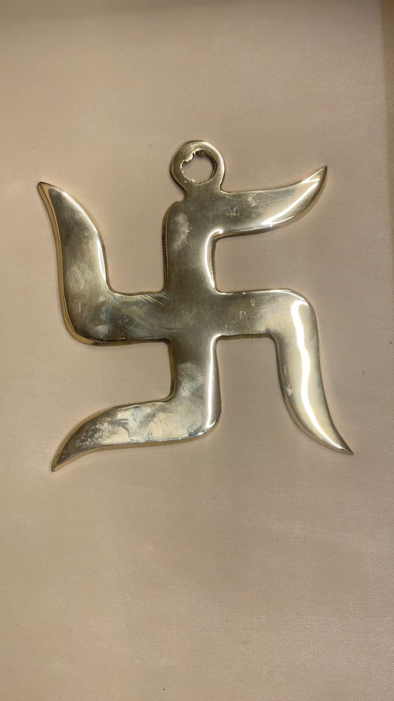 Customer photo review of Brass Swastik Wall Symbol | Vastu Remedy for Main Entrance & Auspicious Energy | 5 & 9 Inch