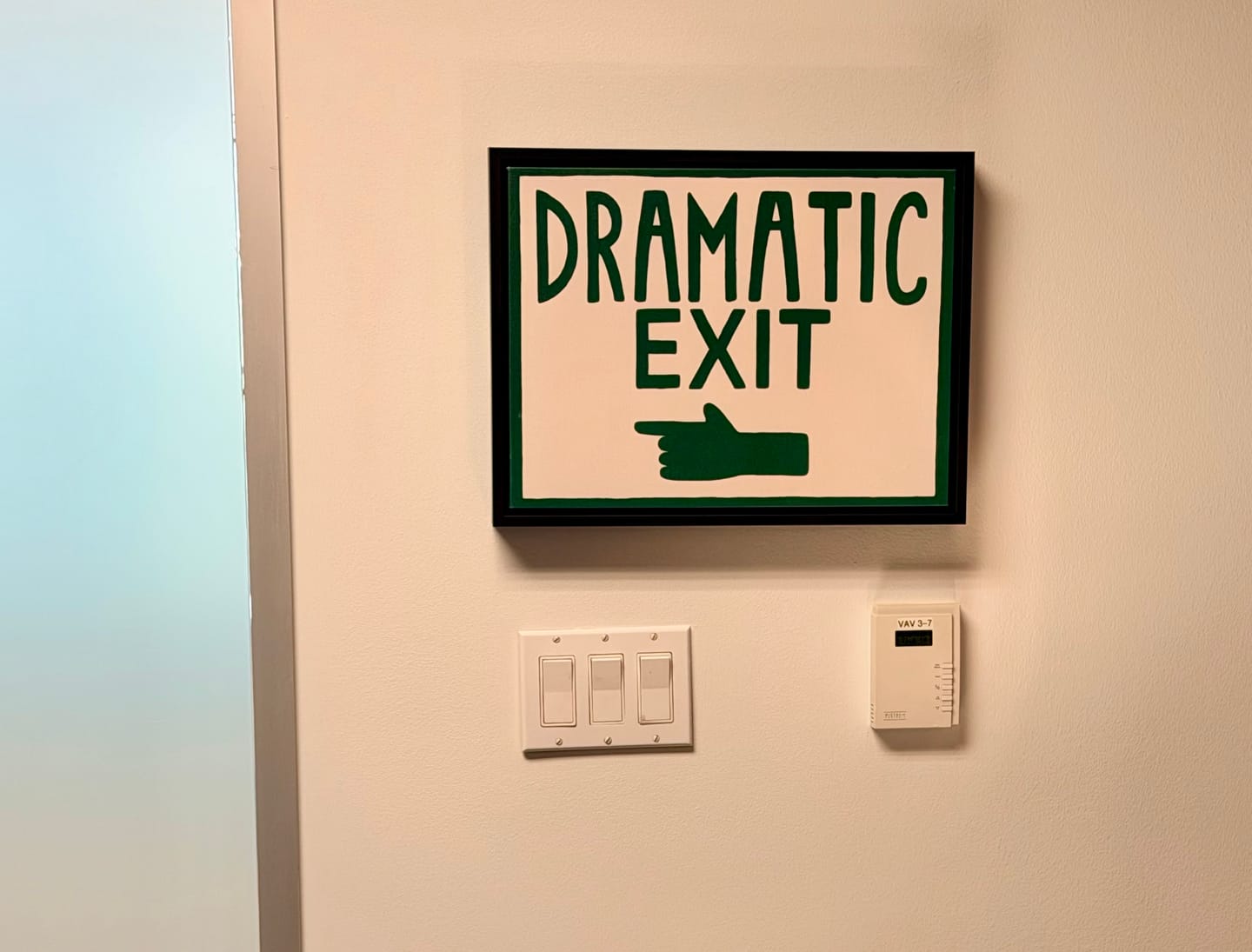 Customer photo review of Dramatic Exit Left Wall Sign