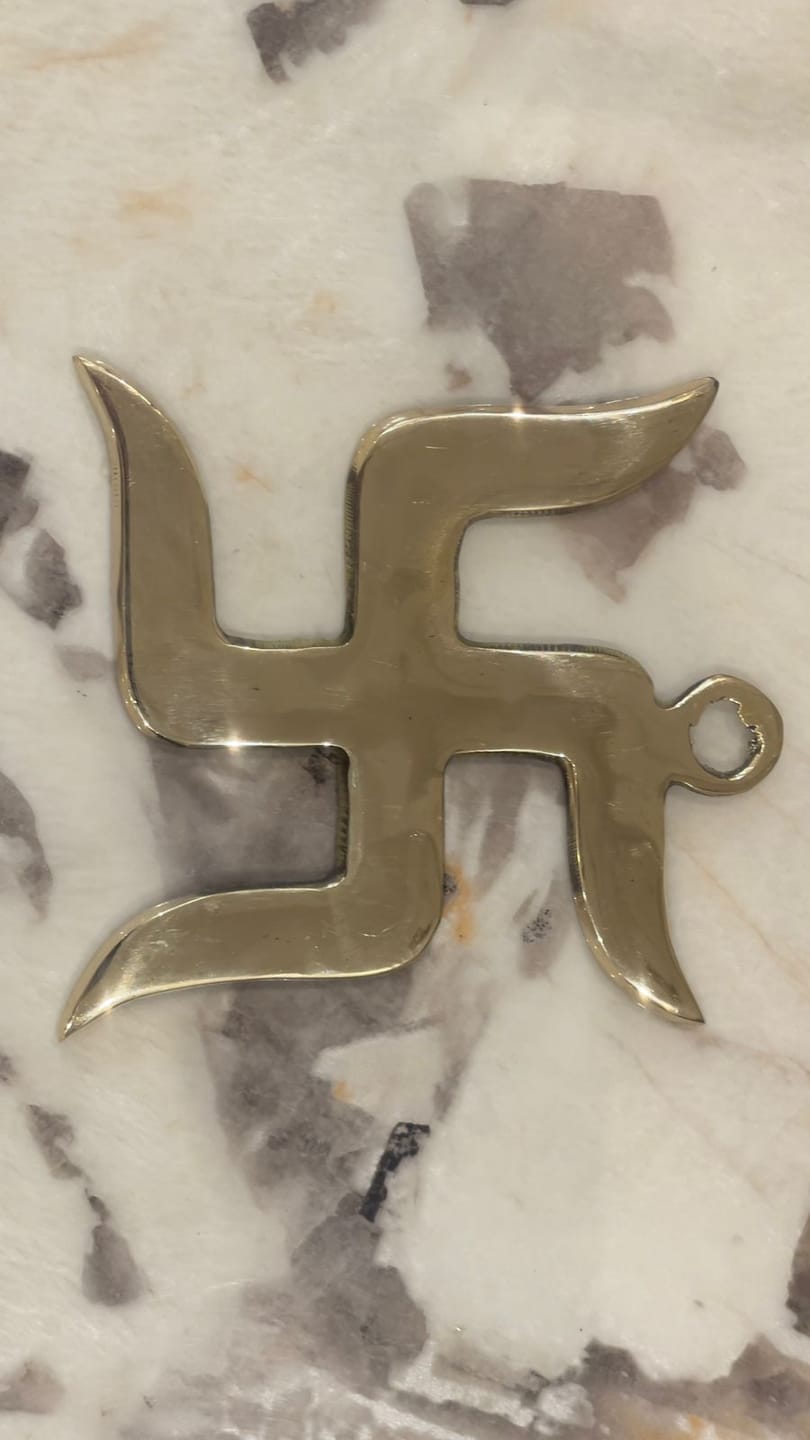 Customer photo review of Brass Swastik Wall Symbol | Vastu Remedy for Main Entrance & Auspicious Energy | 5 & 9 Inch
