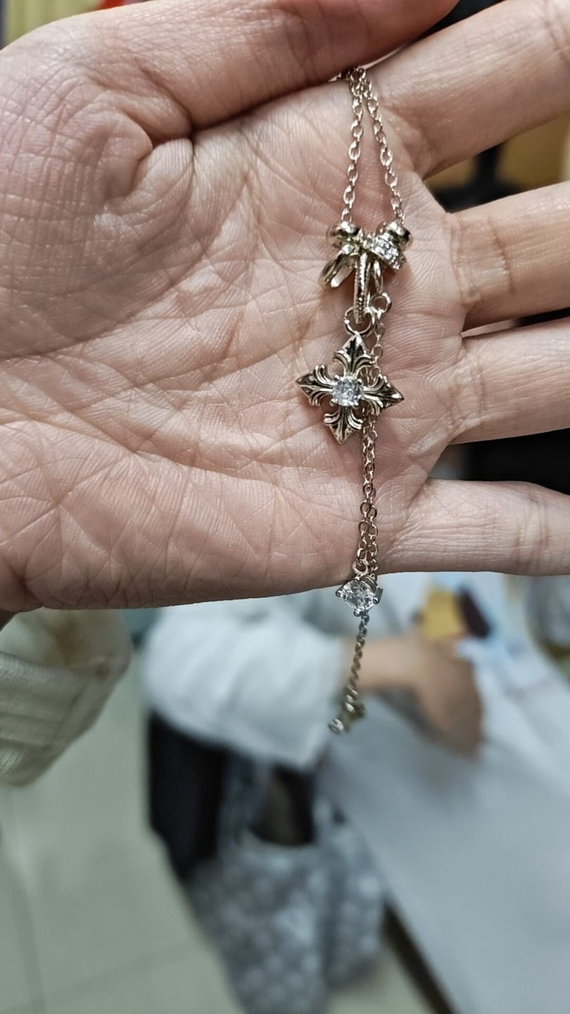 Customer photo review of "Bastet" Vintage Iris Pendant Necklace, with Zirconia