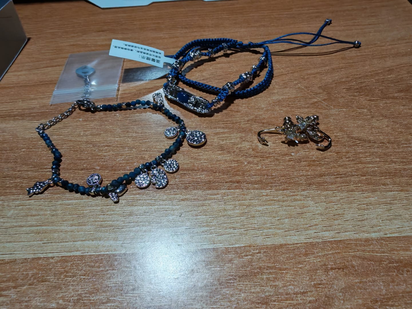 Customer photo review of "MIAO" Platinum Plated Blue Braided Bracelet