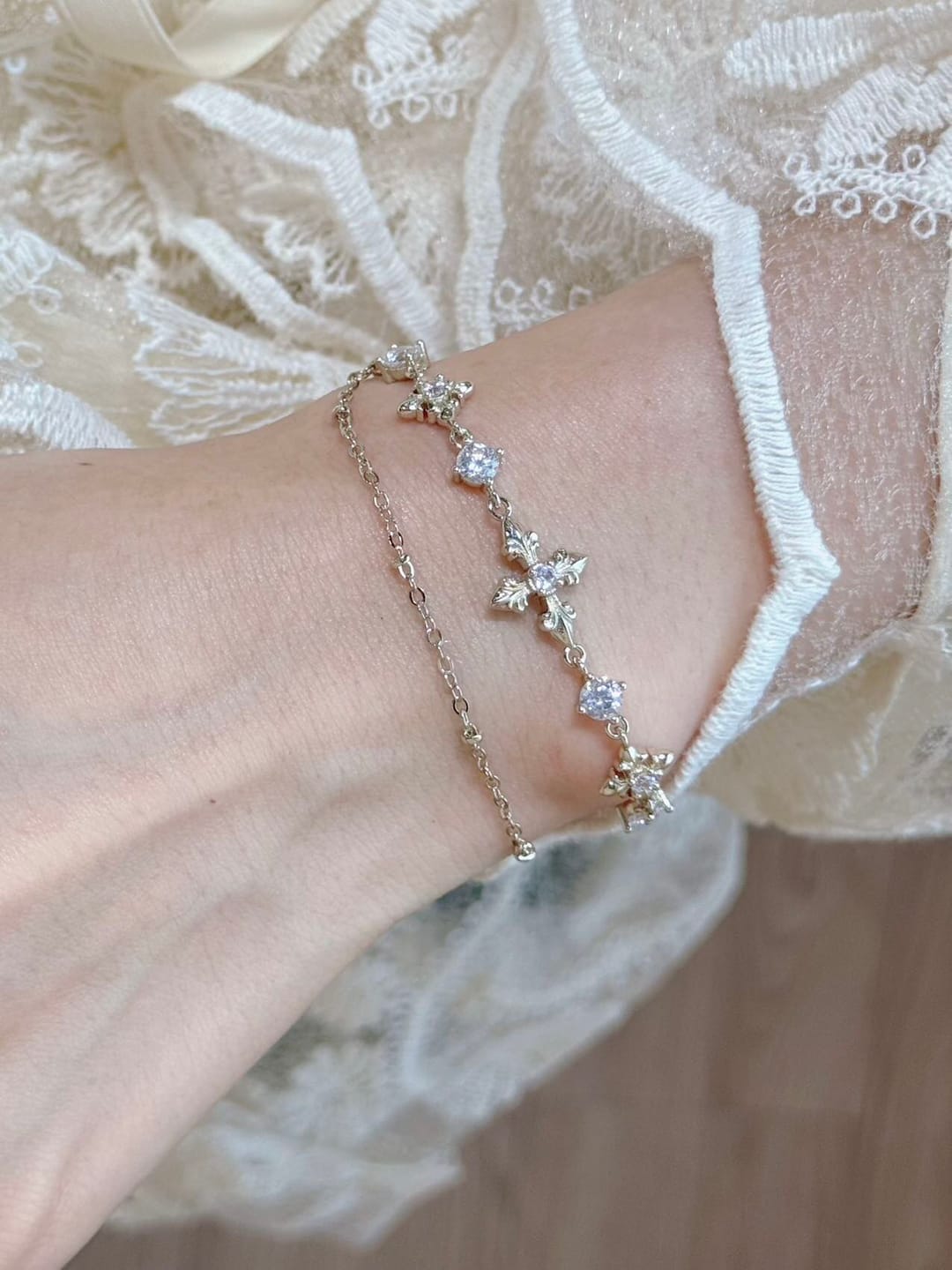 Customer photo review of "Bastet" 14K Gold Plated Layered Iris Zirconia Charm Bracelet