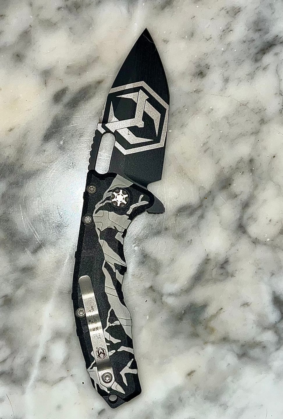 Customer photo review of Heretic Martyr Manual Tanto Show Special, Blade Show West 2026 Exclusive, 3.4" MagnaCut, Utah Beehive and Mountains - Made in USA (H057-BLADE WEST 2026)