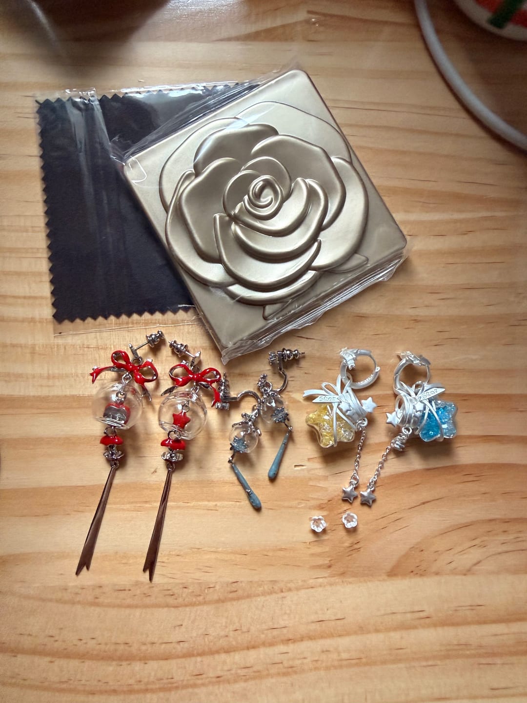 Customer photo review of "WISHING STAR" Platinum Plated Wishing Bottle Dangle Earrings
