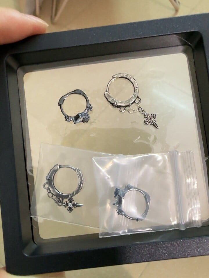 Customer photo review of "Irises" 925 Sterling Silver Gothic Oxidized Dangle Cross Earrings