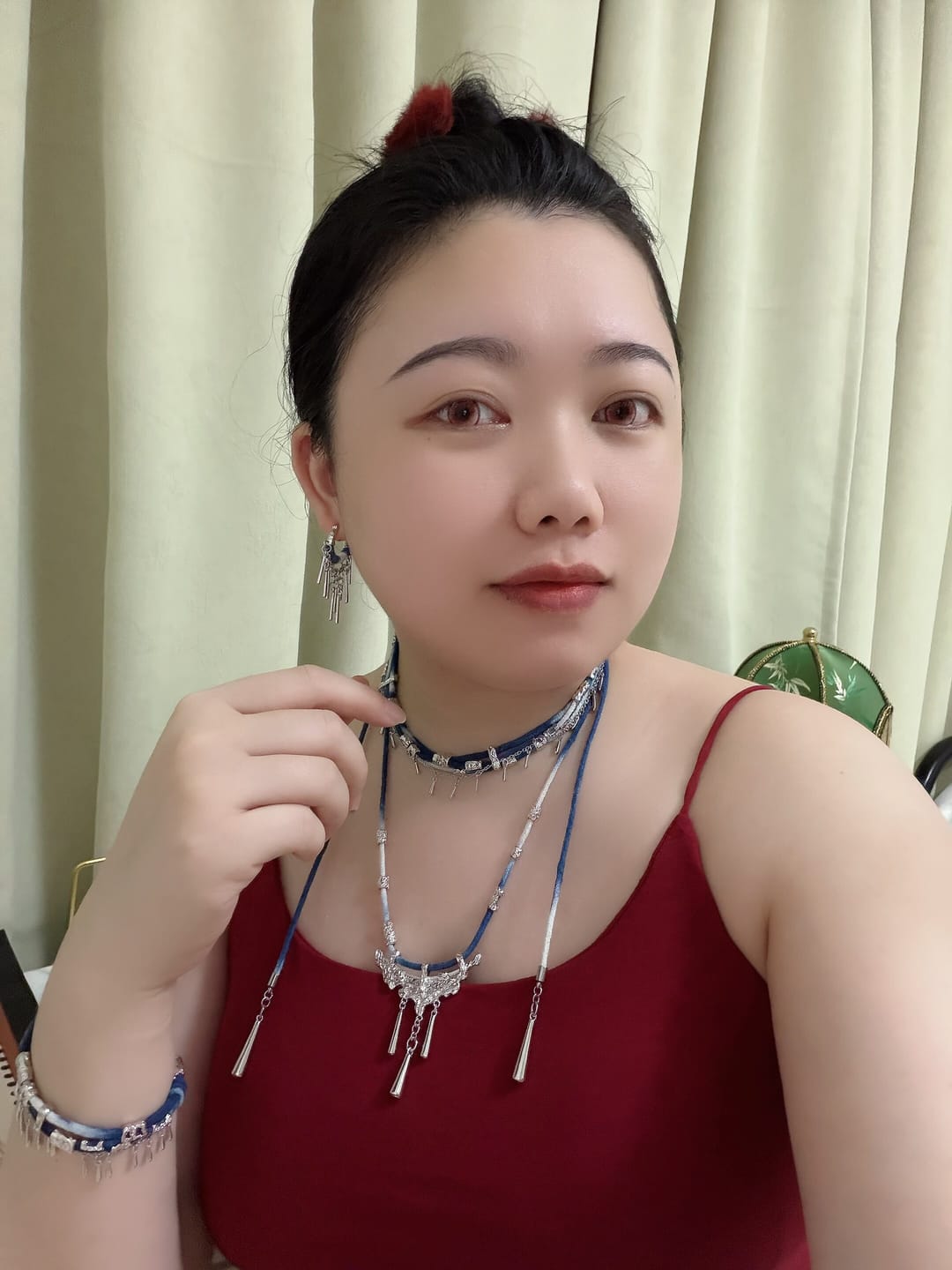 Customer photo review of "MIAO" Platinum Plated Ethnic Braided Tassel Bracelet, Statement Woven Handchain